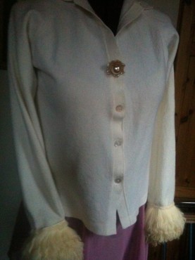 Vintage sweater, vintage button and fur cuffs added